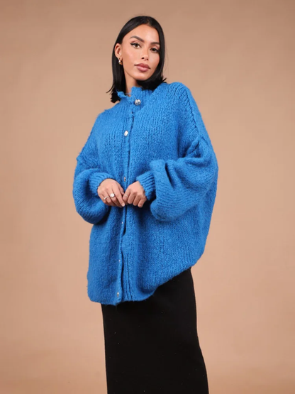 Gebreid damesvest met knopen – Oversized model met ballonmouwen